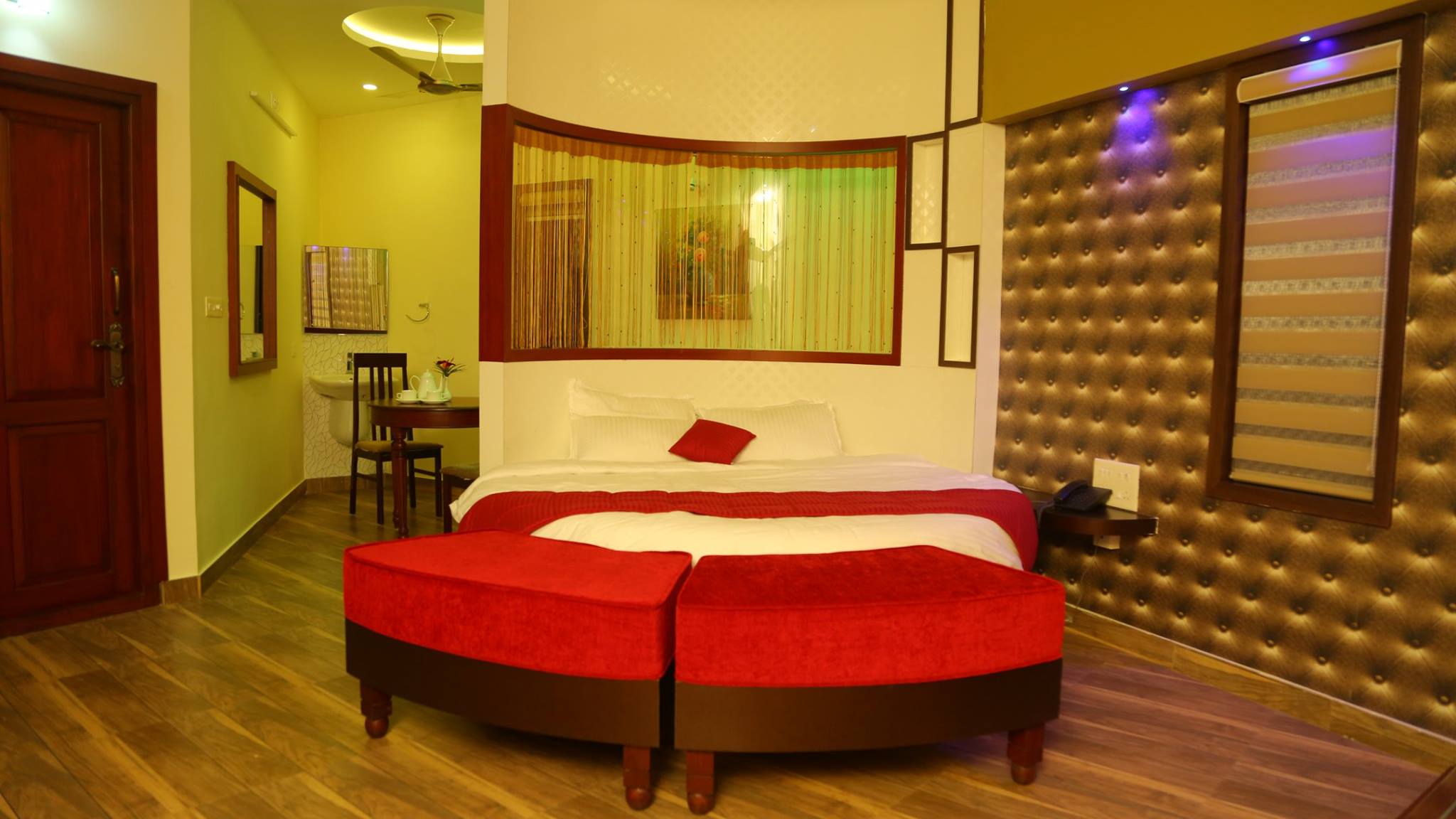 Deluxe suite with elegant wood finish at Yamunatheeram luxury resort Kerala
